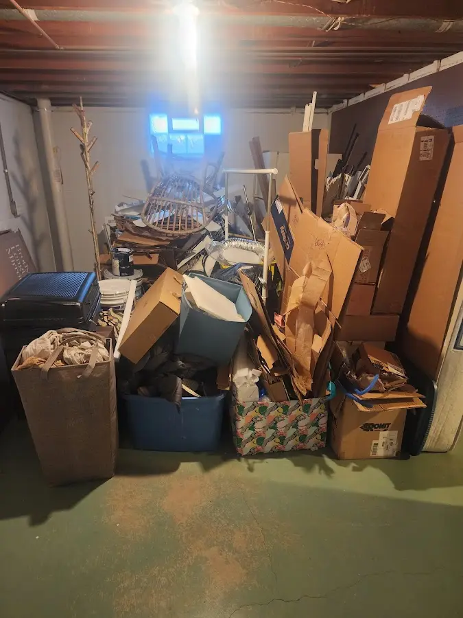 Roll-off dumpster container at job site for 2 Yard Dumpster Rental in Union Springs